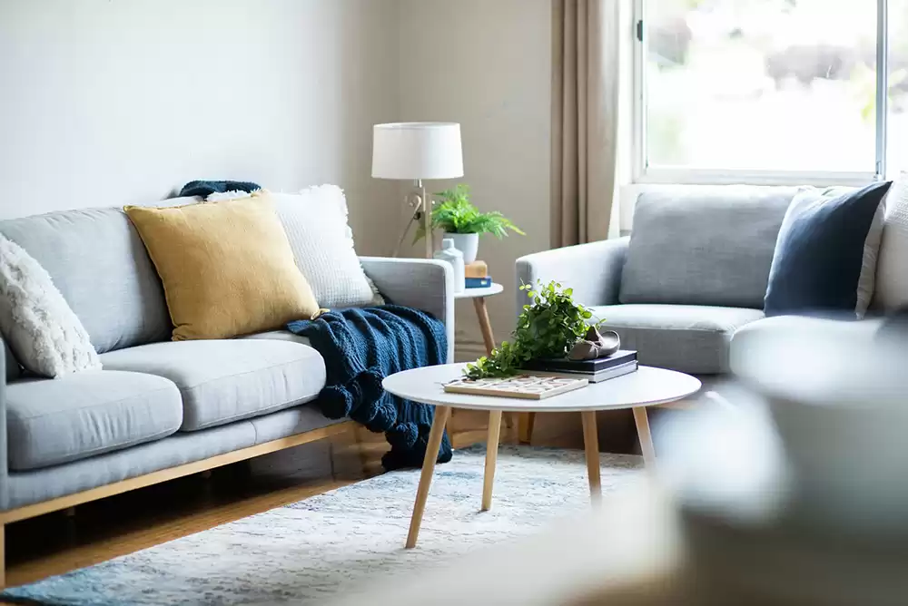 a living room featuring furniture rentals